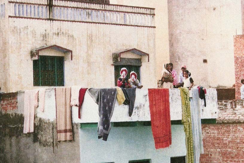 Kids with MacDonald's clown masks, Varanasi, 2007, Mixed media processed photograph,  50 x 70 cm, edition of 5